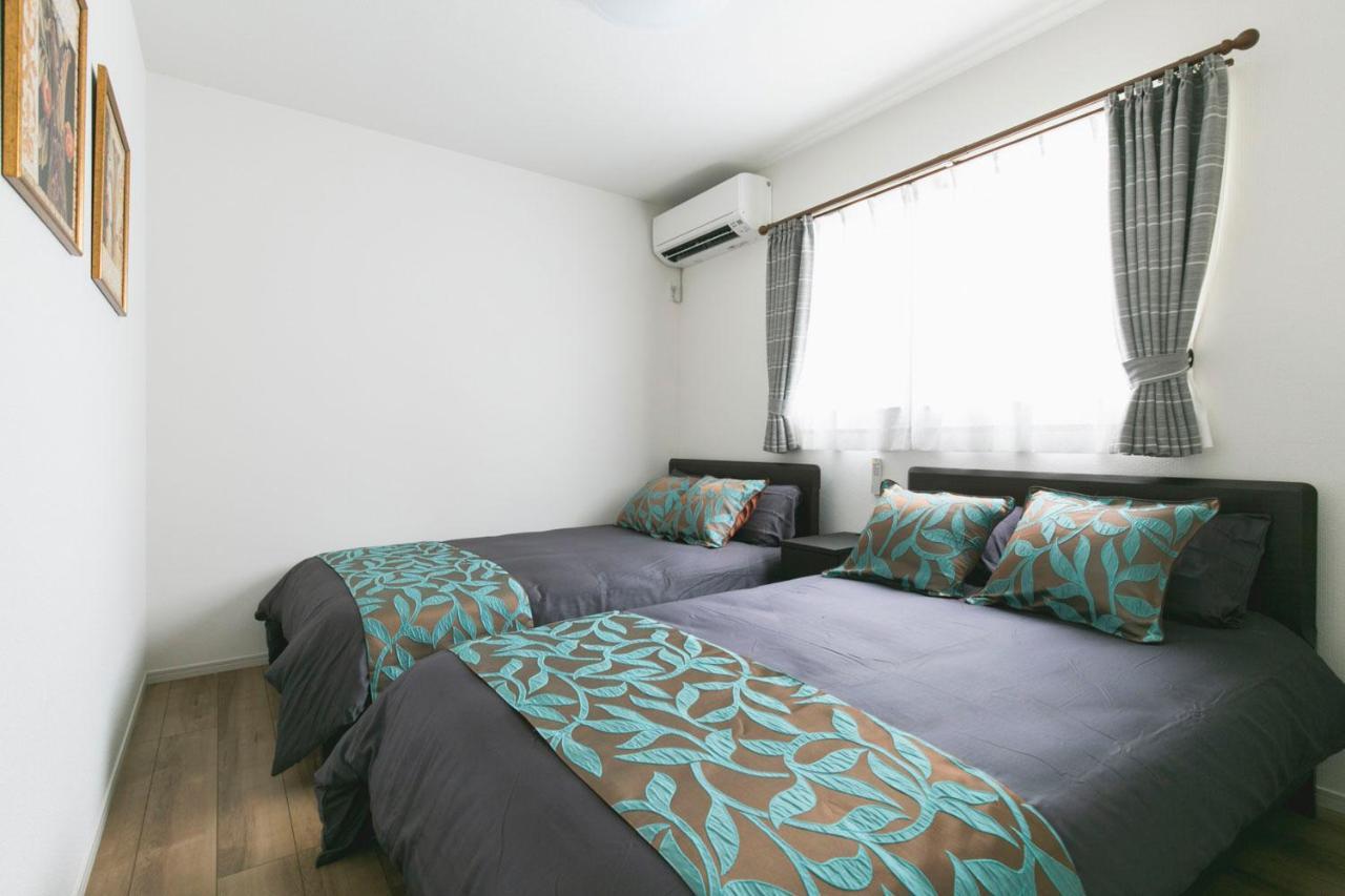 Villa 那覇空港まで10分#新築戸建#国際通りdfs近く#駐車場2台無料#Free Wifi#最大12名 Naha Esterno foto